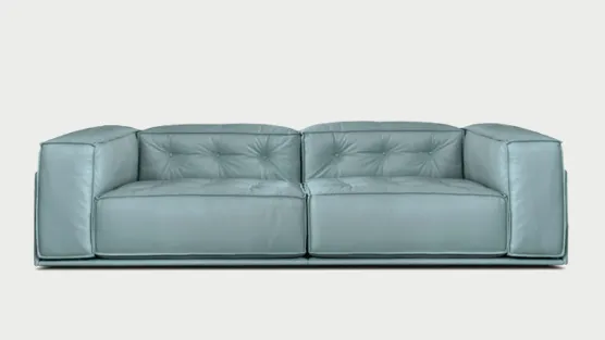 divano in pelle e bottoni Glamour 